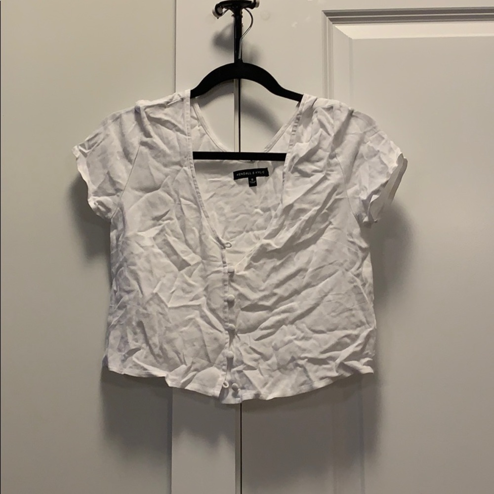 Kendall and Kylie white button down crop top